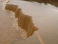 ทางหลวงรับน้ำท่วมถนนพังยับ